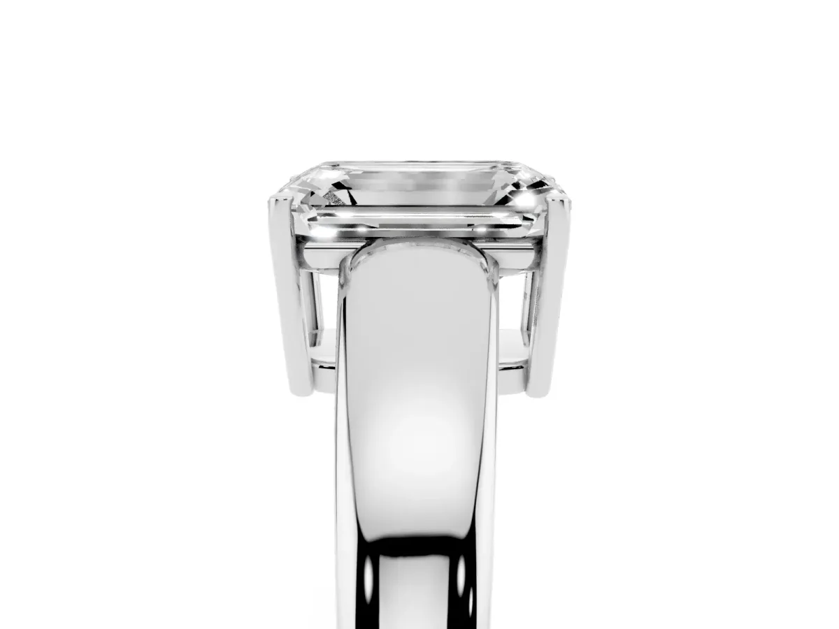Emerald Cut Solitaire Diamond Ring with Tapered Band and Four-Prong Setting White gold