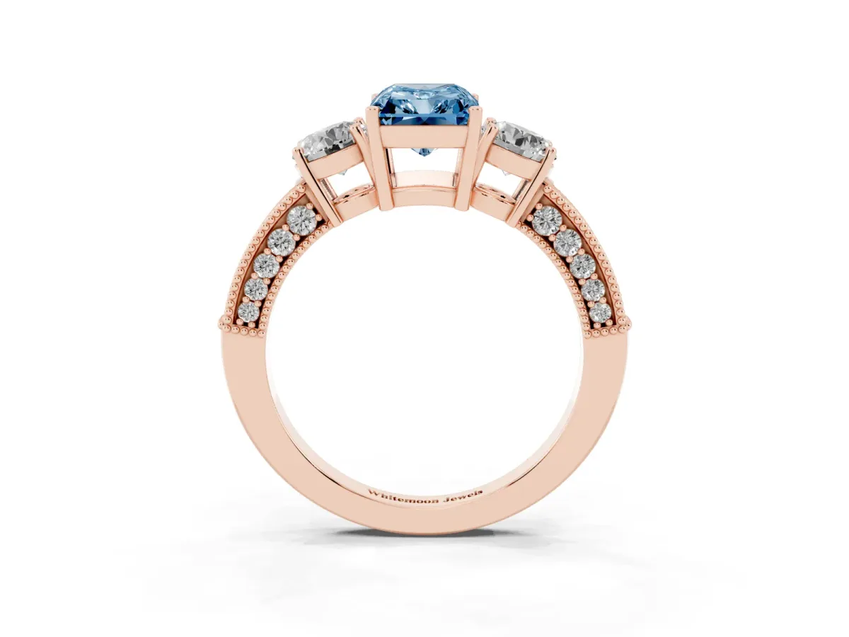 Fancy Blue Radiant Cut Three-Stone Diamond Ring with Pavé Band and Four-Prong Setting Rose gold