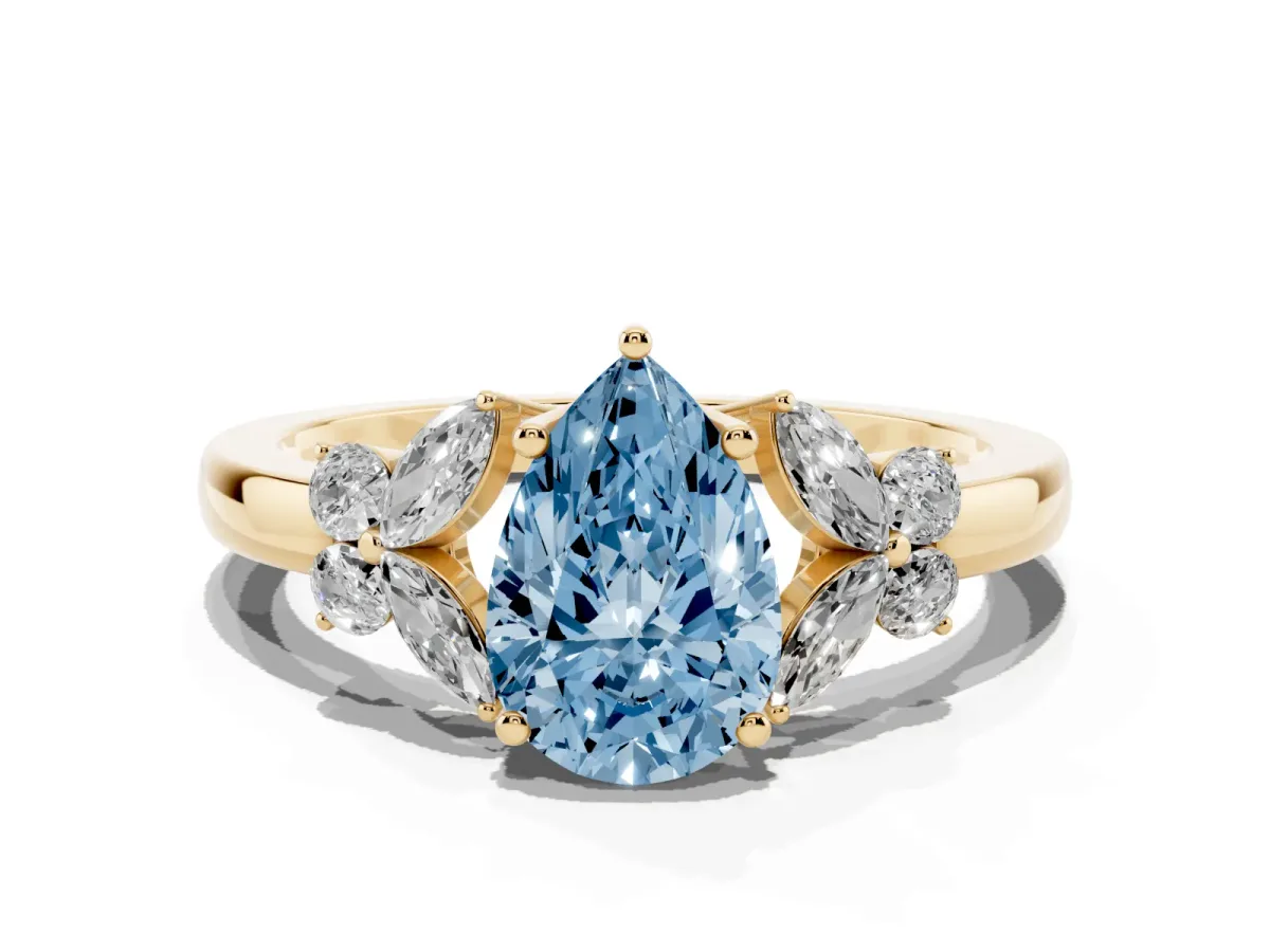 Fancy Blue Pear Cut Cut Solitaire Floral Diamond Ring with Four-Prong Setting Yellow gold