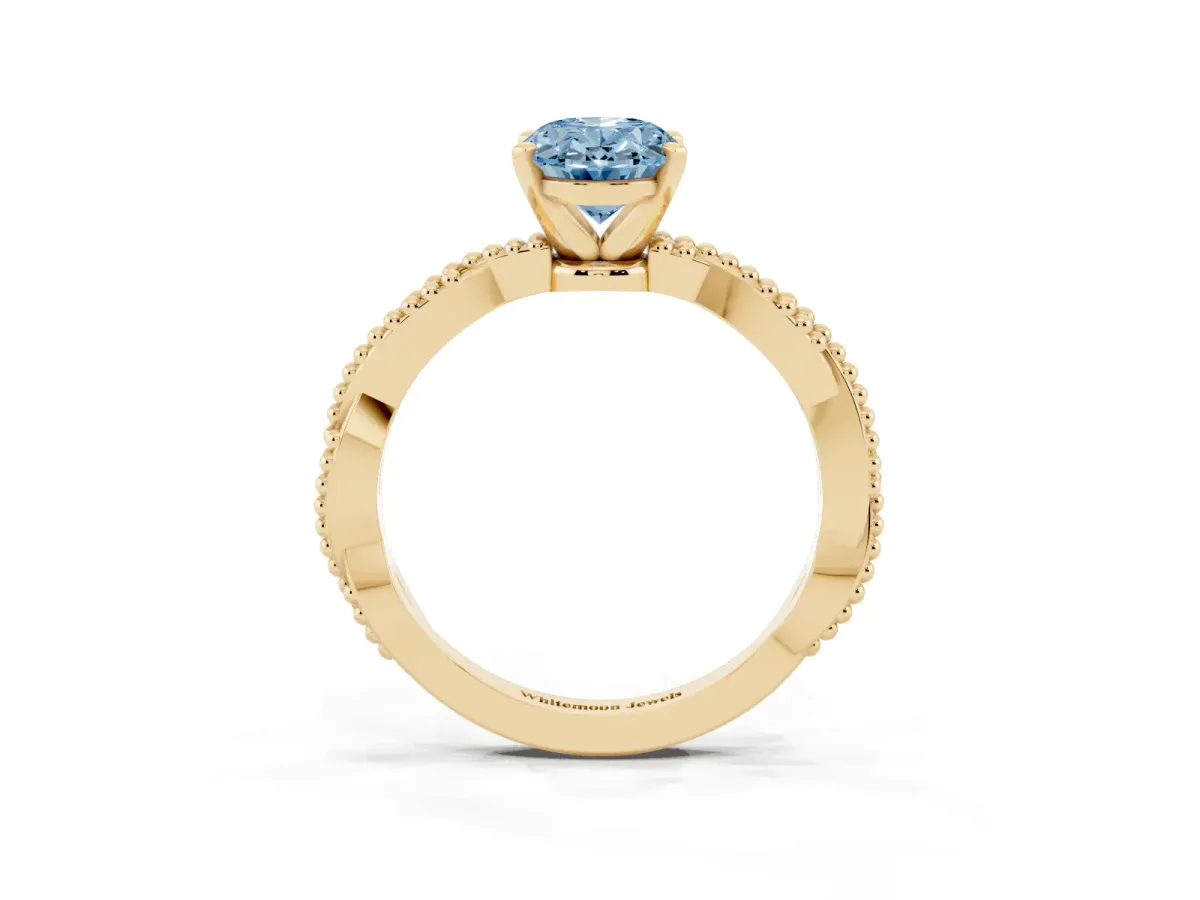 Fancy Blue Oval Cut Solitaire Twisted Band with Bead Prong Setting Yellow gold