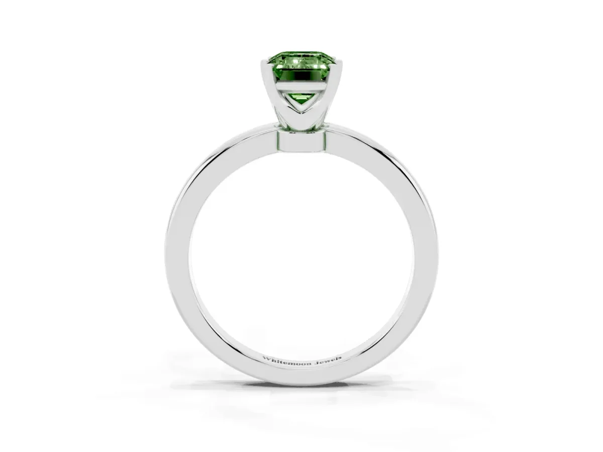 Fancy Green Emerald Cut Solitaire Diamond Ring with Six-Prong Setting on a Classic Band Platinum