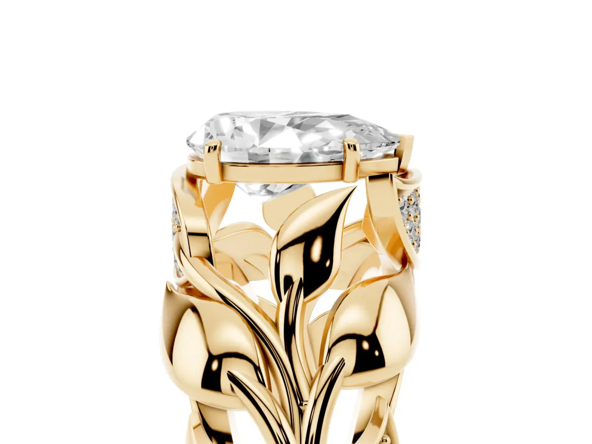 Pear Cut Diamond Leaf-Inspired Engagement Ring with Round Accents and Prong Setting Yellow gold