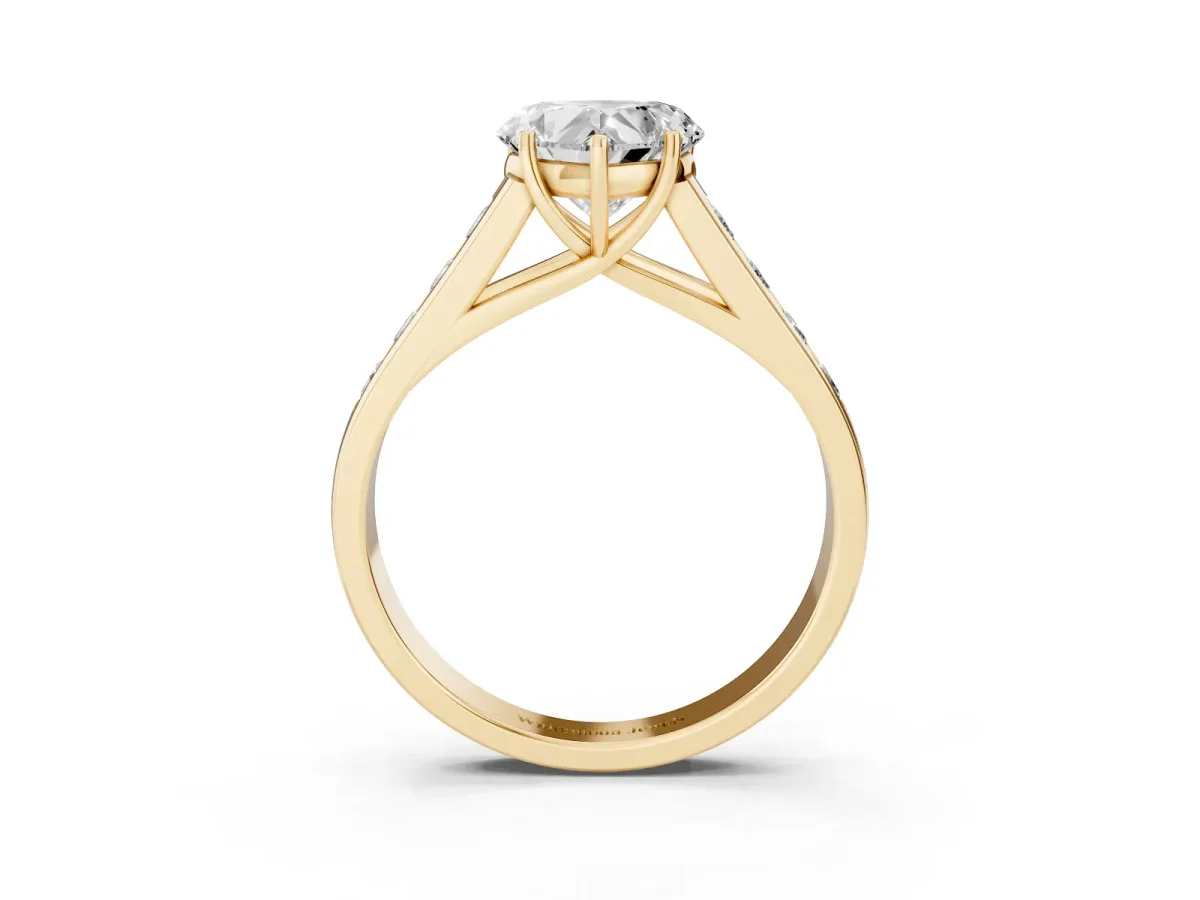 Heart Cut Brilliant Channel-Set Solitaire Ring with Four-Prong Setting Yellow gold