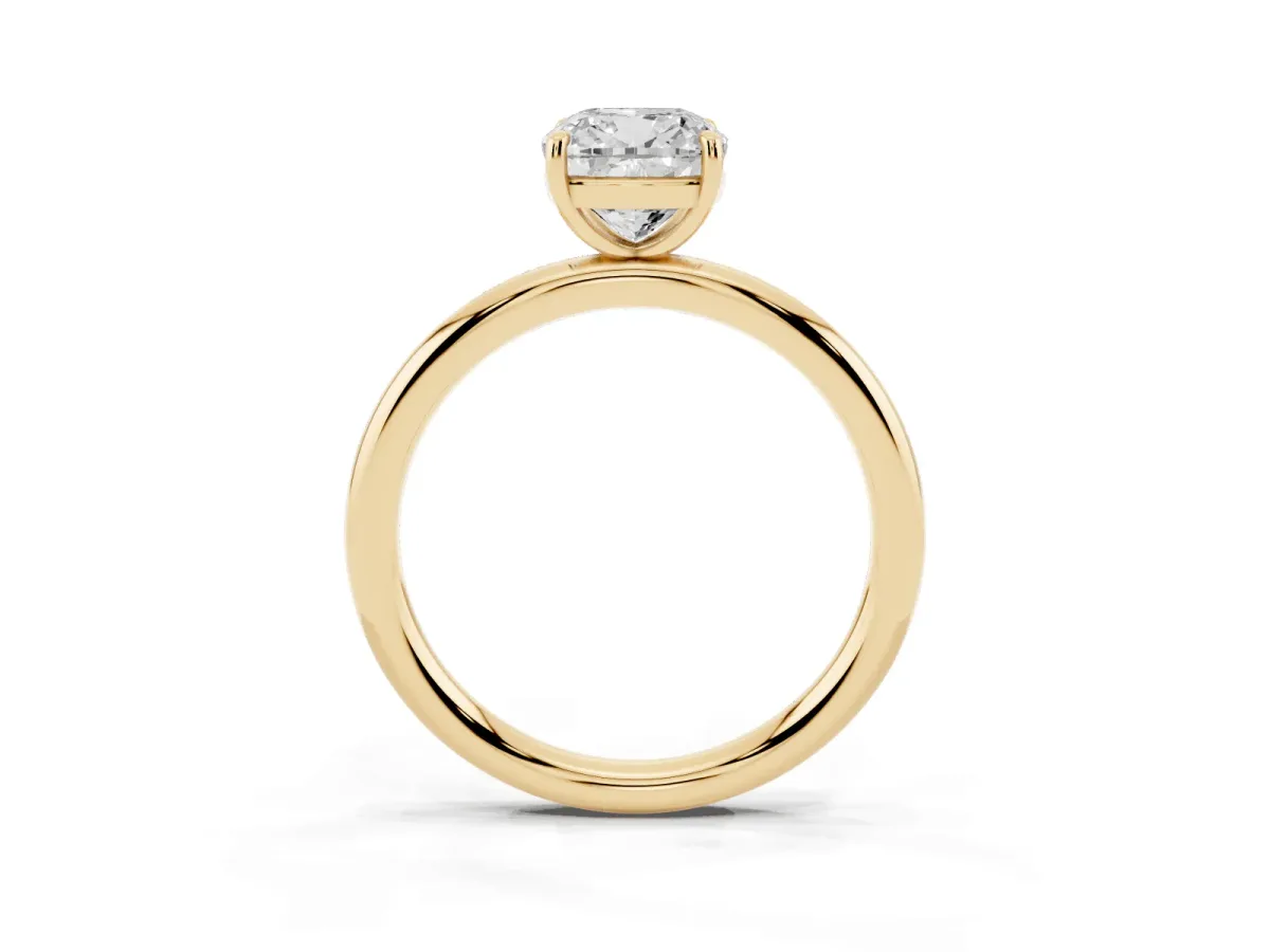 Cushion Cut Solitaire Diamond Ring with Four-Prong Setting on a Plain Band Yellow gold