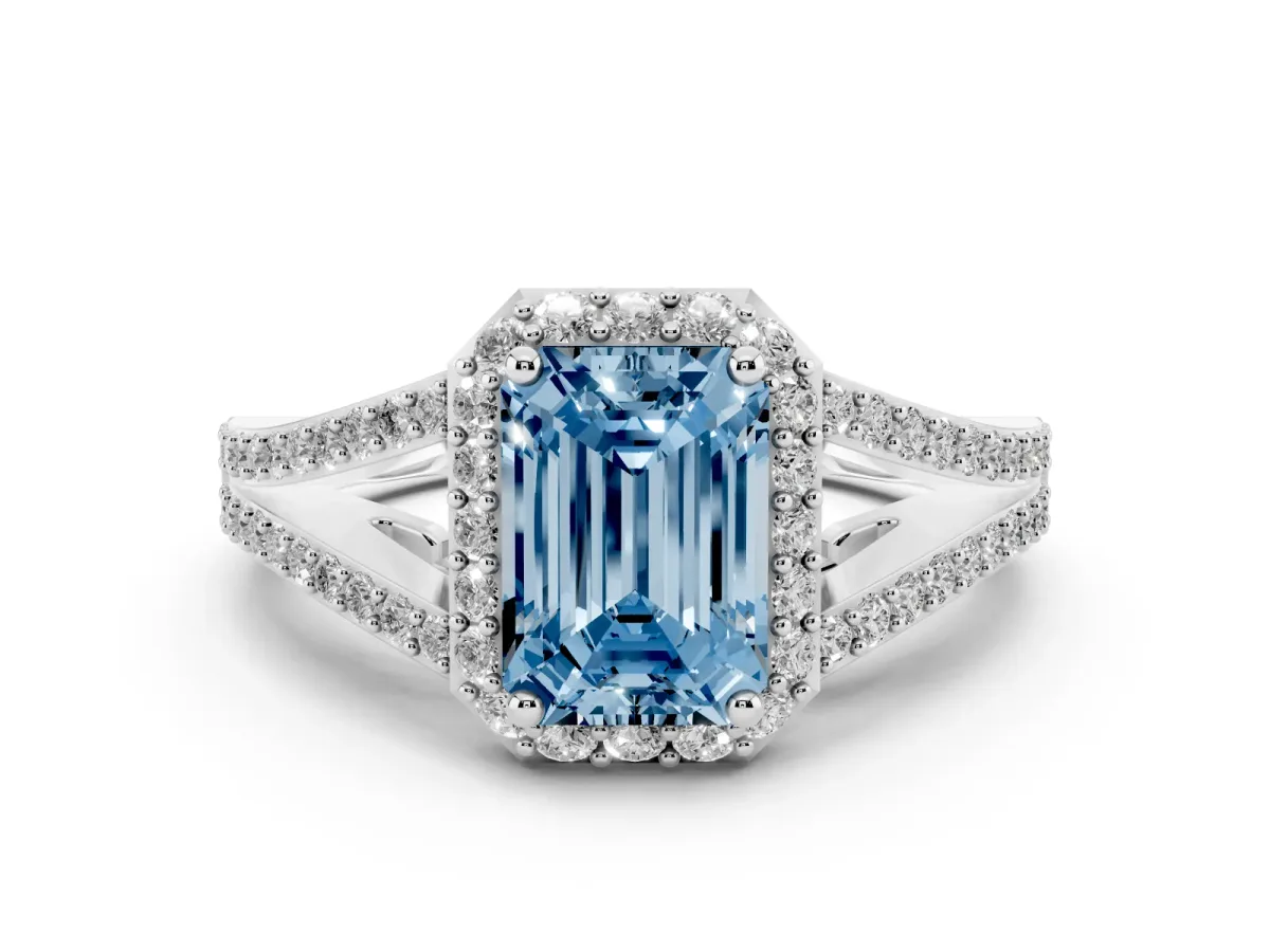 Fancy Blue Emerald Cut Halo Split Shank Pave Diamond Ring with Four-Prong Setting Silver