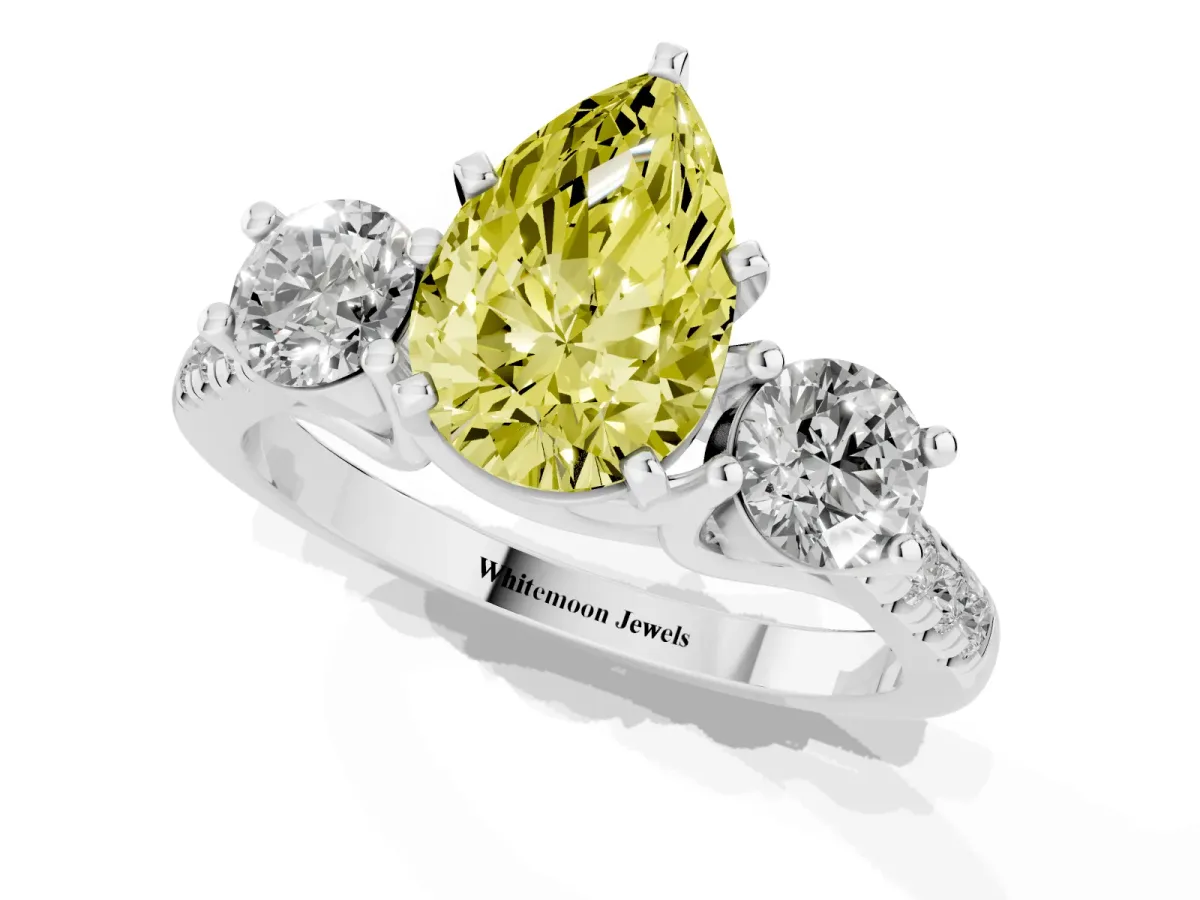 Fancy Yellow Three-Stone Pear Cut Diamond Pavé Band with Four-Prong Setting Platinum