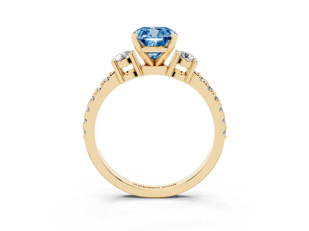 Fancy Blue Cushion Cut Three-Stone Diamond Pavé Band with Prong Setting Yellow gold