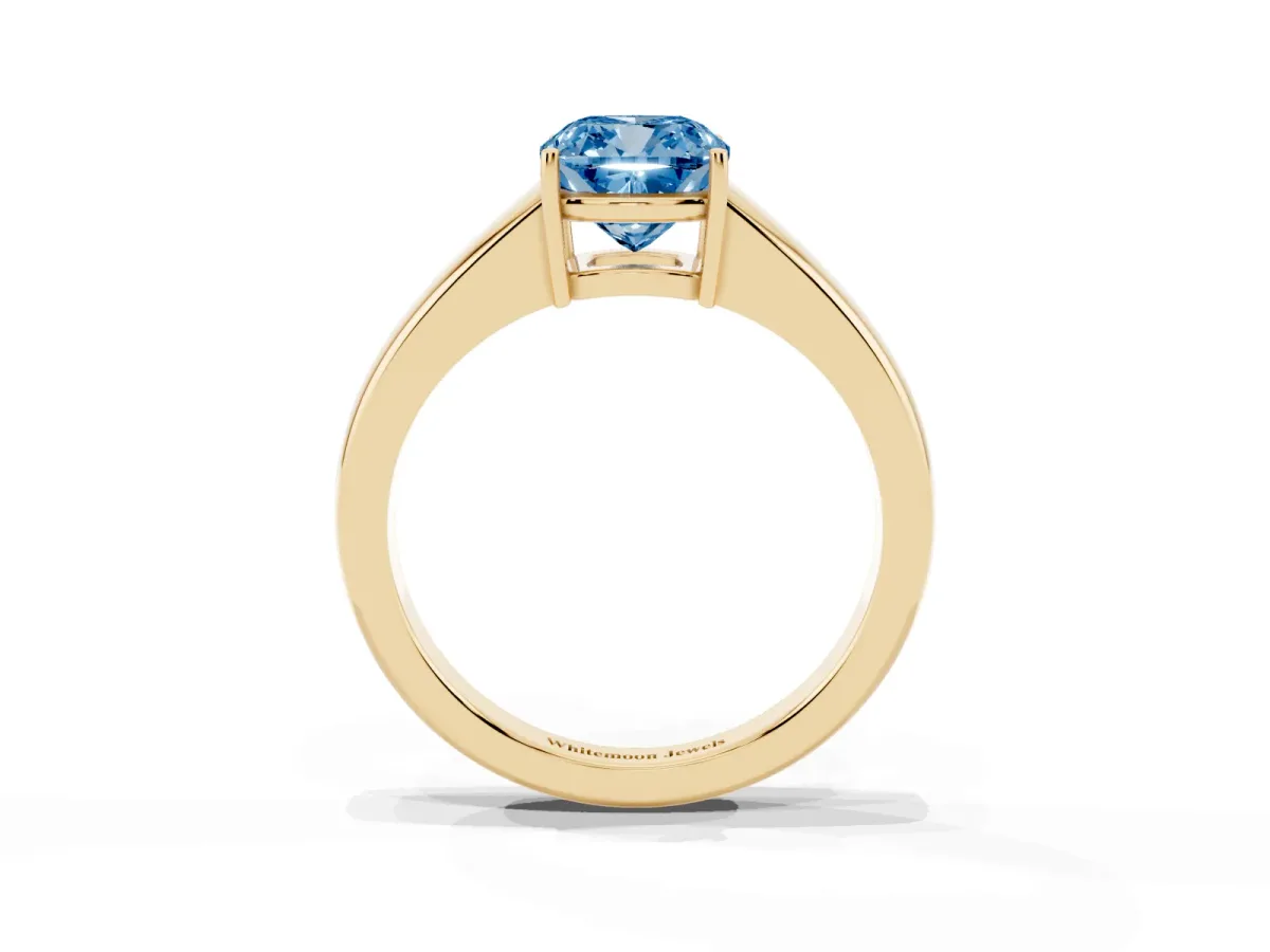 Fancy Blue Cushion Cut Solitaire Diamond Ring with Tapered Band and Four-Prong Setting Yellow gold