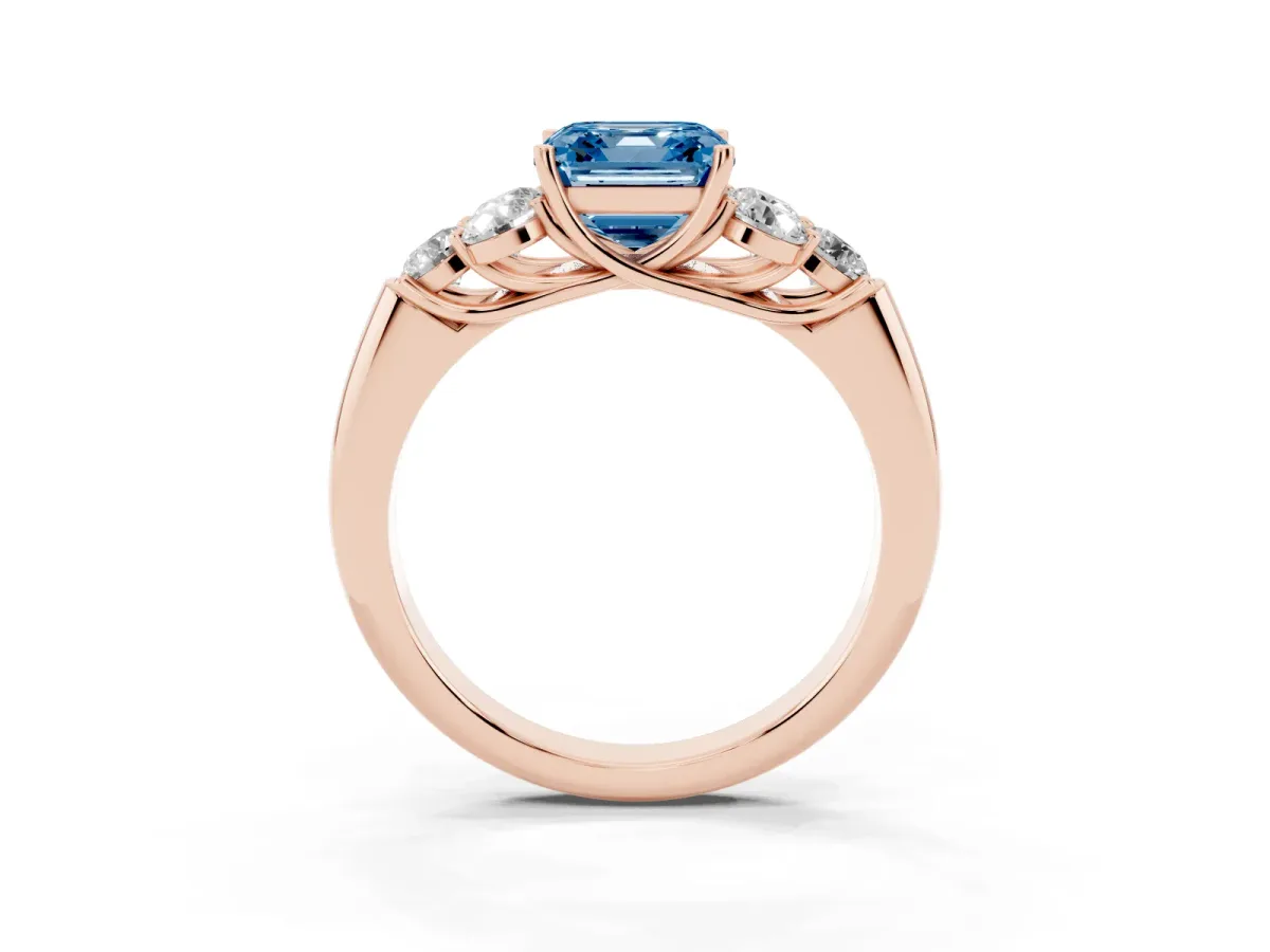 Fancy Blue Asscher Cut Cut Diamond Cluster Ring with Round Accent Stones and Prong Setting on a Classic Band Rose gold