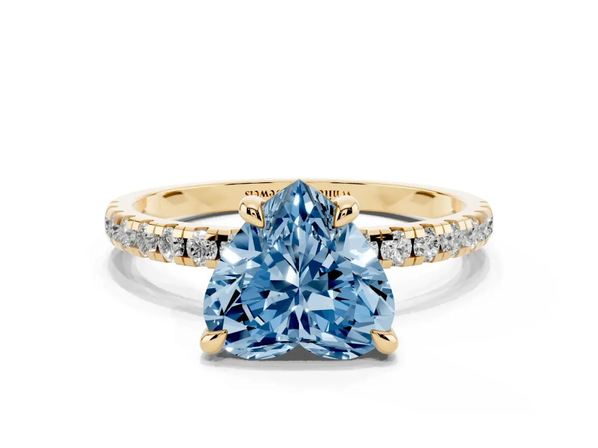 Fancy Blue Heart Cut Diamond Brilliant Solitaire Ring with Pavé Band and Four-Prong Setting Yellow gold