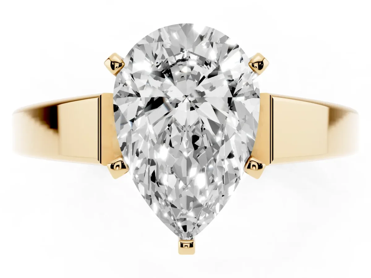 Pear Cut Solitaire Engagement Ring with Four-Prong Setting and Tapered Band Yellow gold