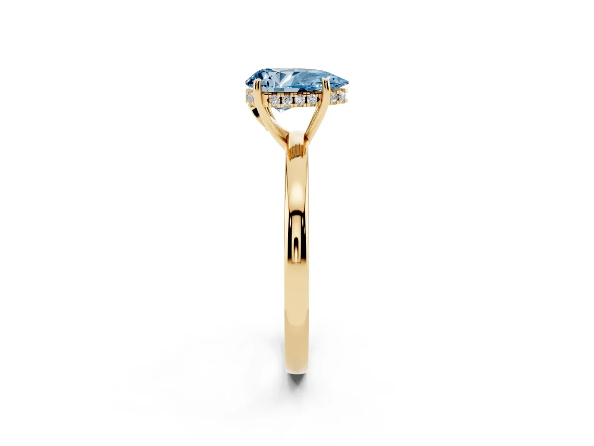 Fancy Blue Pear Cut Solitaire Diamond Ring with Prong Setting and Plain Band Yellow gold