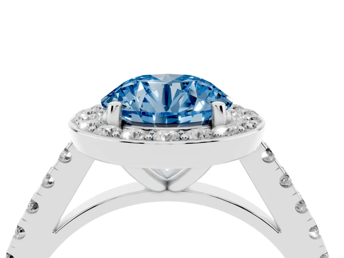 Fancy Blue Round Cut Diamond Halo Ring with Round Pavé Split Shank and Prong Setting Platinum