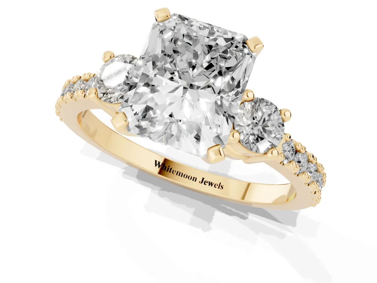 Radiant Cut Three-Stone Diamond Pavé Band with Prong Setting Yellow gold