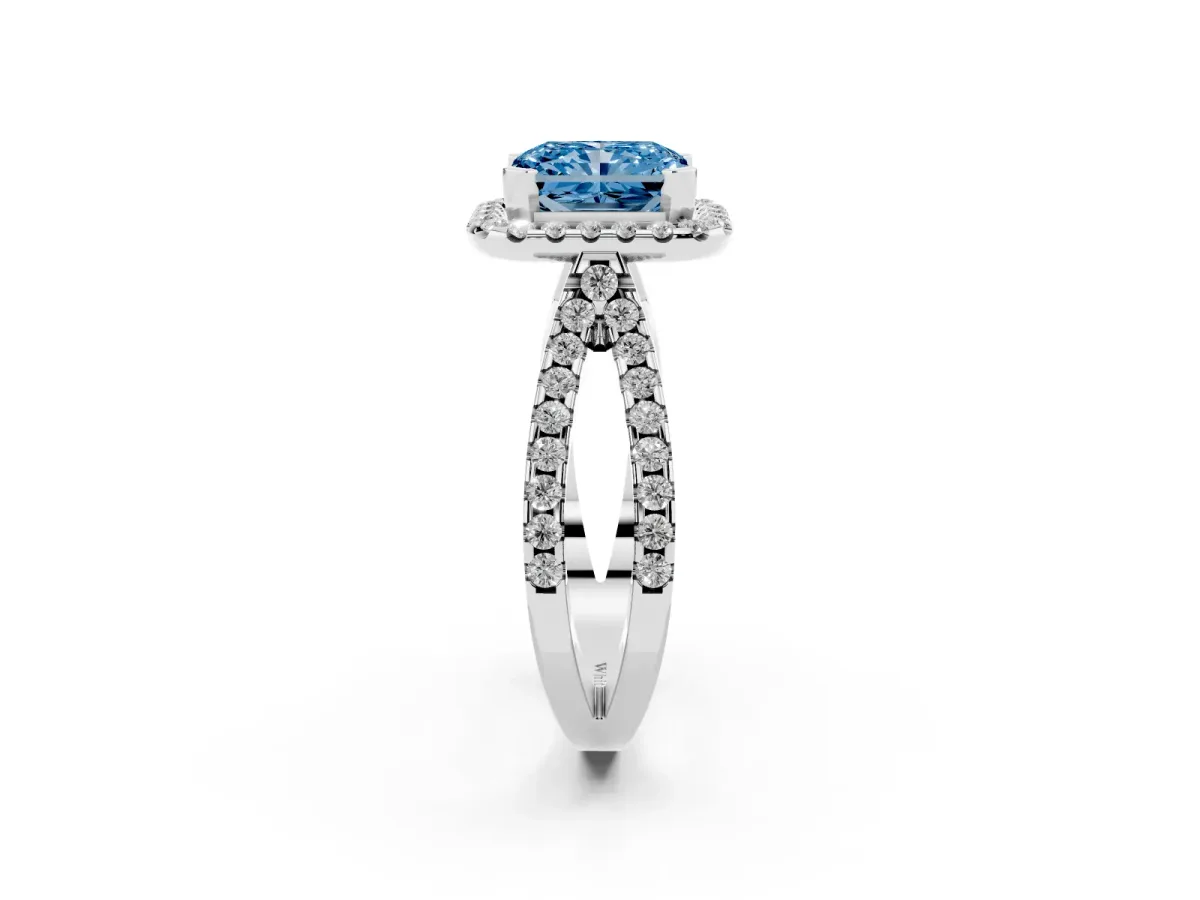 Fancy Blue Radiant Cut Diamond Halo Ring with Split Shank Pavé Band and Prong Setting Platinum