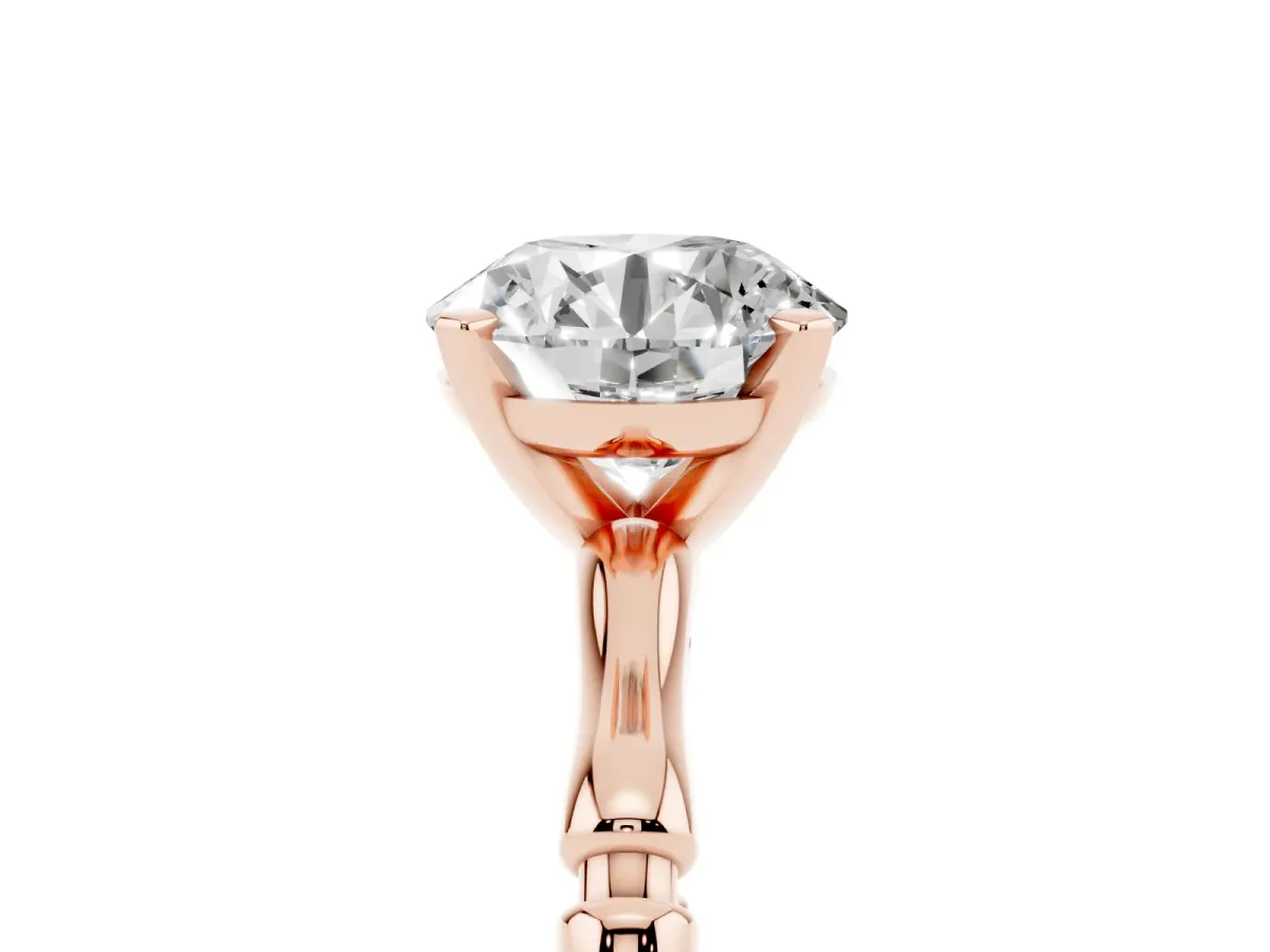 Round Cut Solitaire Diamond Ring with Bamboo Band and Four-Prong Setting Rose gold