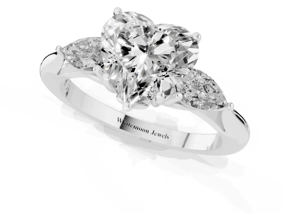 Three-Stone Heart Cut Diamond Ring with Pear Side Stones in Four-Prong Setting Silver