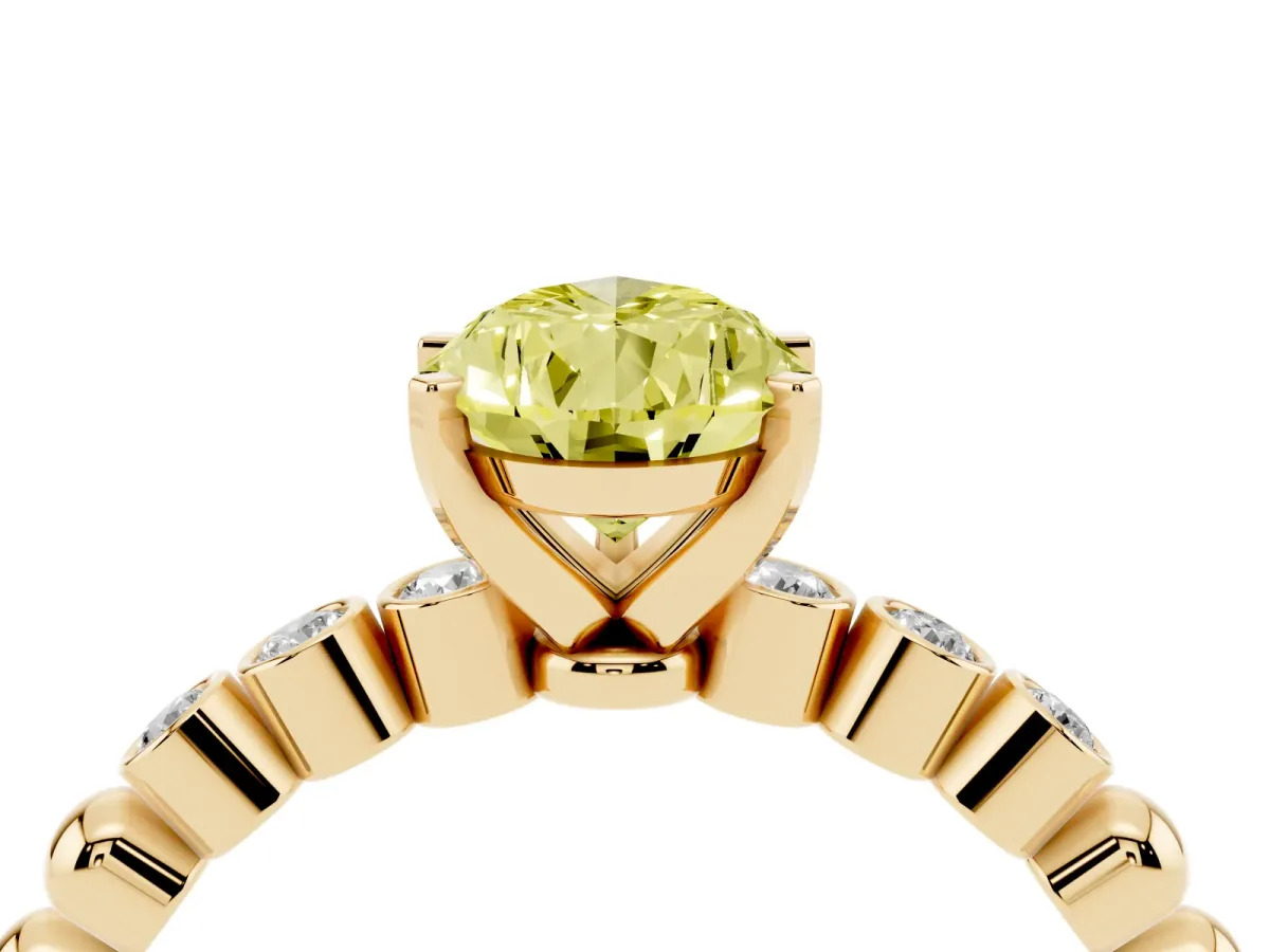 Fancy Yellow Pear Cut Solitaire Bezel Accent Diamond Engagement Ring with Beaded Band and Four-Prong Setting Yellow gold