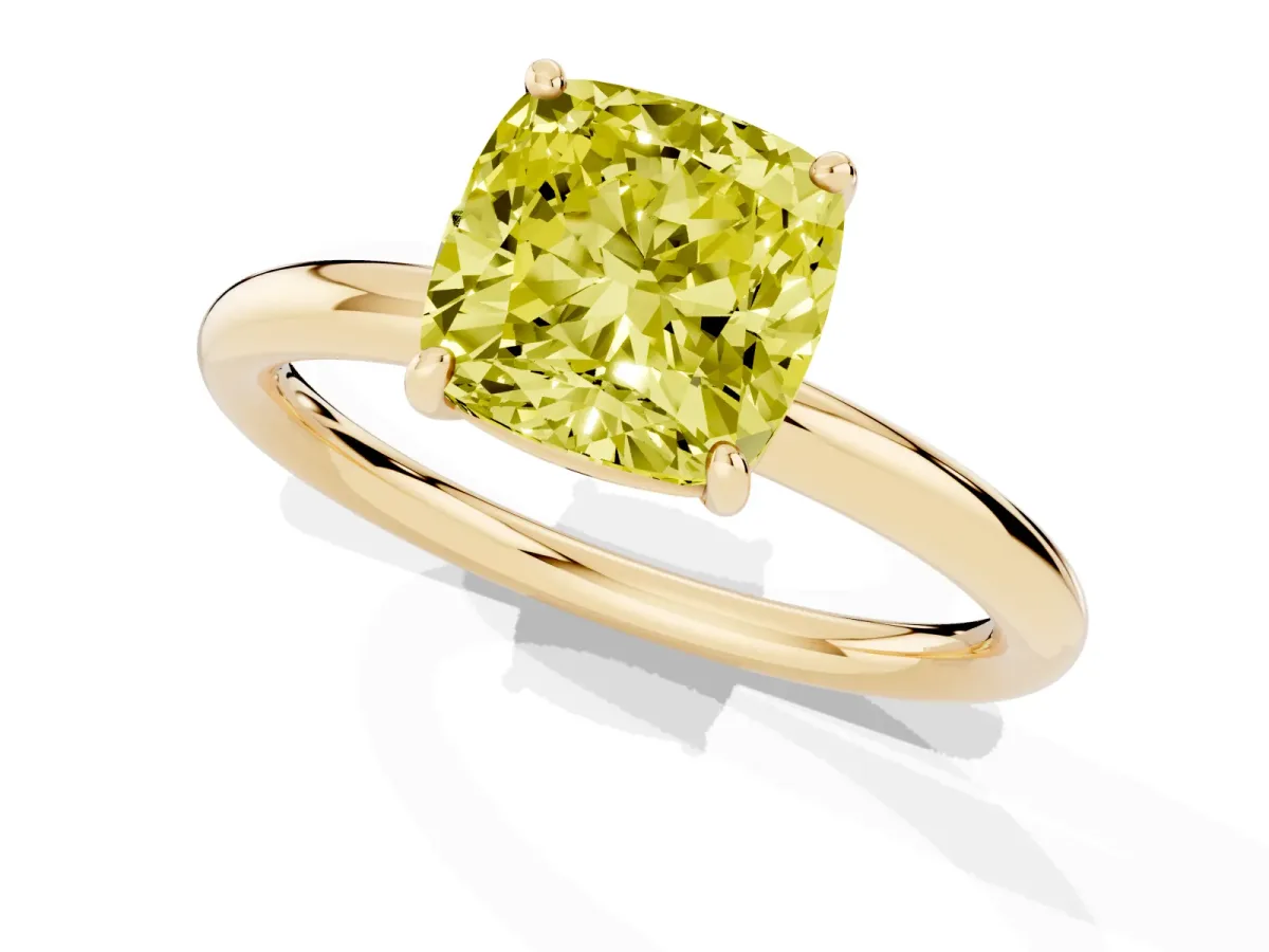 Fancy Yellow Cushion Cut Solitaire Diamond Ring with Four-Prong Setting on a Plain Band Yellow gold