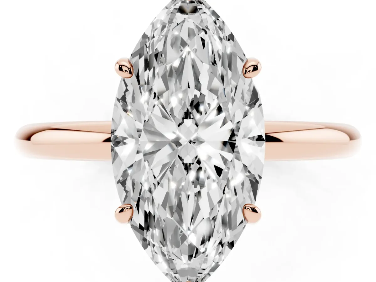 Marquise Cut Solitaire Diamond Ring with Four-Prong Setting on a Plain Band Rose gold