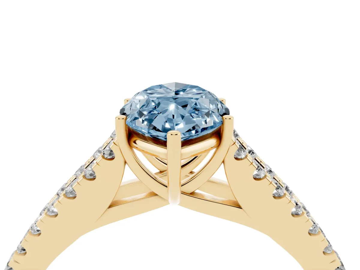 Fancy Blue Marquise Cut Diamond Split Shank Pavé Engagement Ring with Four-Prong Setting Yellow gold