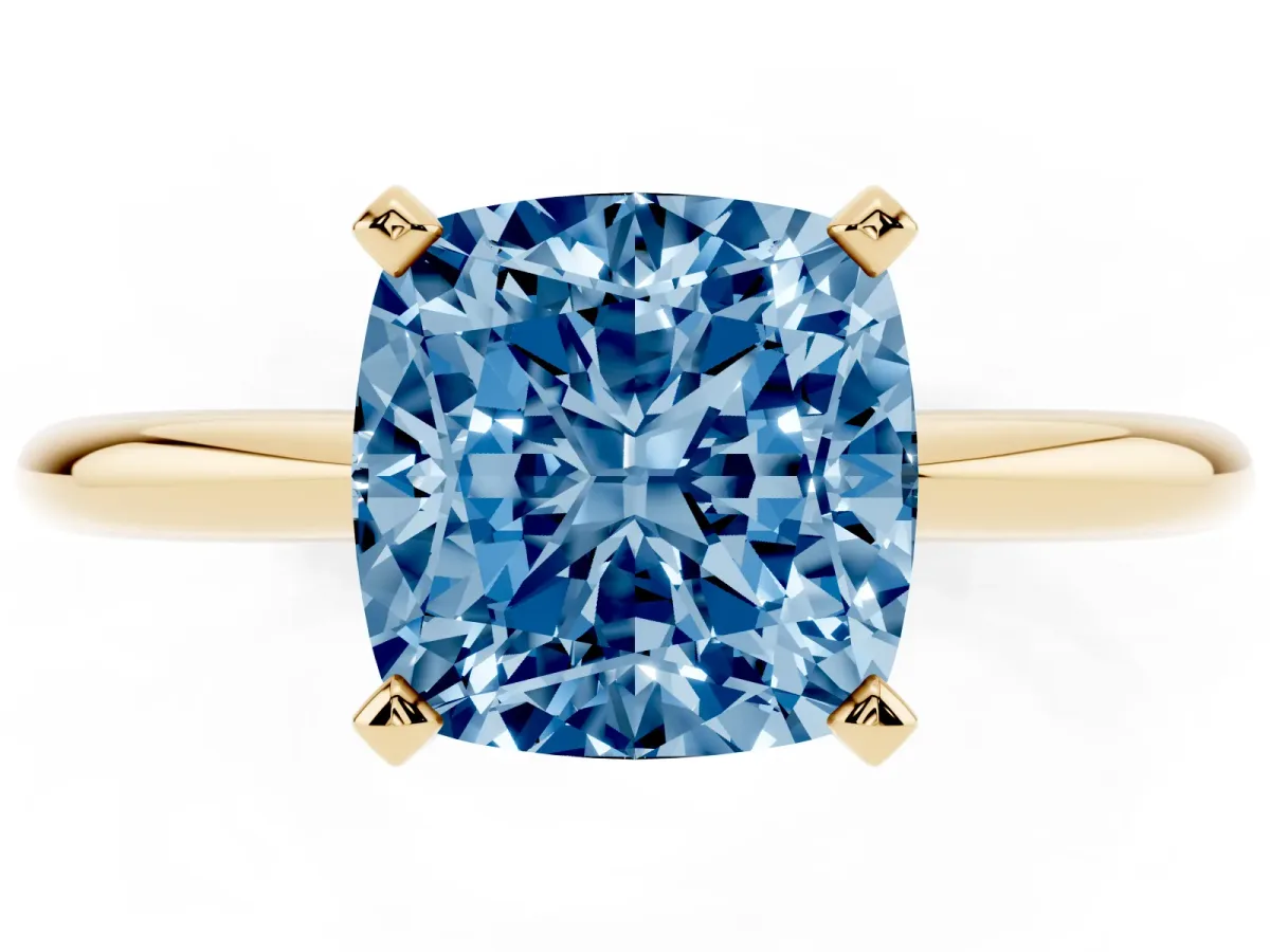 Fancy Blue Cushion Cut Diamond Solitaire Ring with Prong Setting and Classic Band Yellow gold