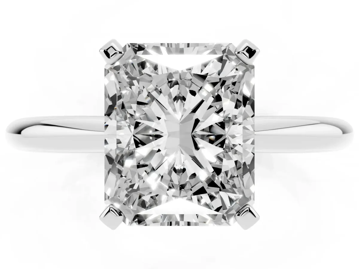 Radiant Cut Diamond Solitaire Ring with Prong Setting and Classic Band Silver