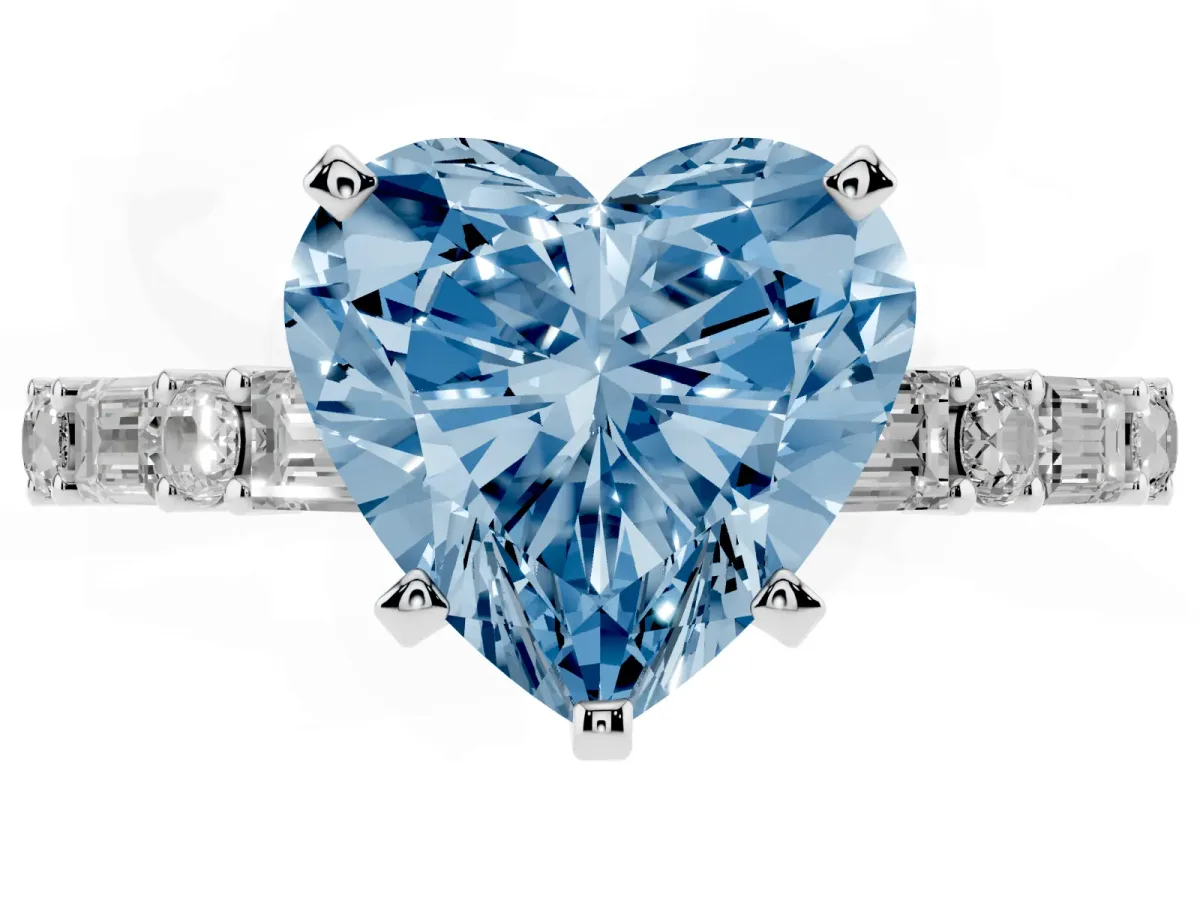 Fancy Blue Heart Cut Diamond Solitaire with Side Baguettes and Channel Set Band Silver