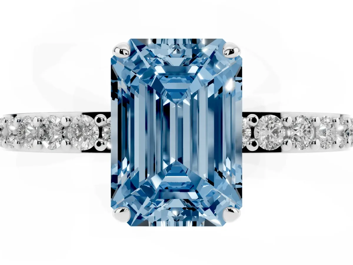 Fancy Blue Emerald Cut Diamond Pavé Engagement Ring with Round Accents and Prong Setting Platinum