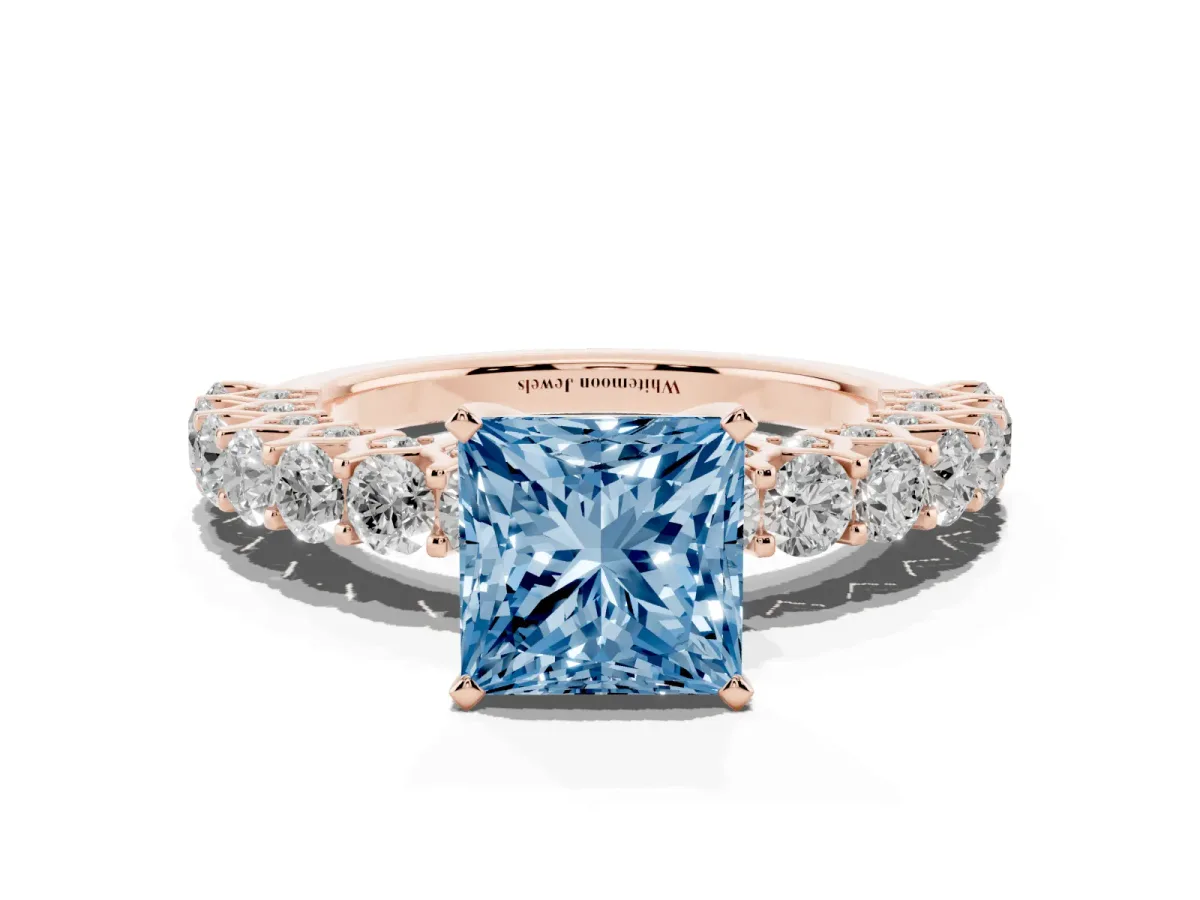 Fancy Blue Princess Cut Diamond Solitaire Ring with Shared Prong Pavé Band and Four-Prong Setting Rose gold