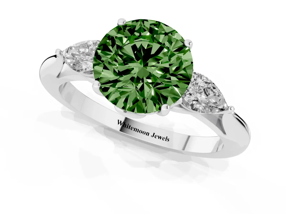 Fancy Green Three-Stone Round Cut Diamond Ring with Pear Side Stones in Four-Prong Setting Platinum