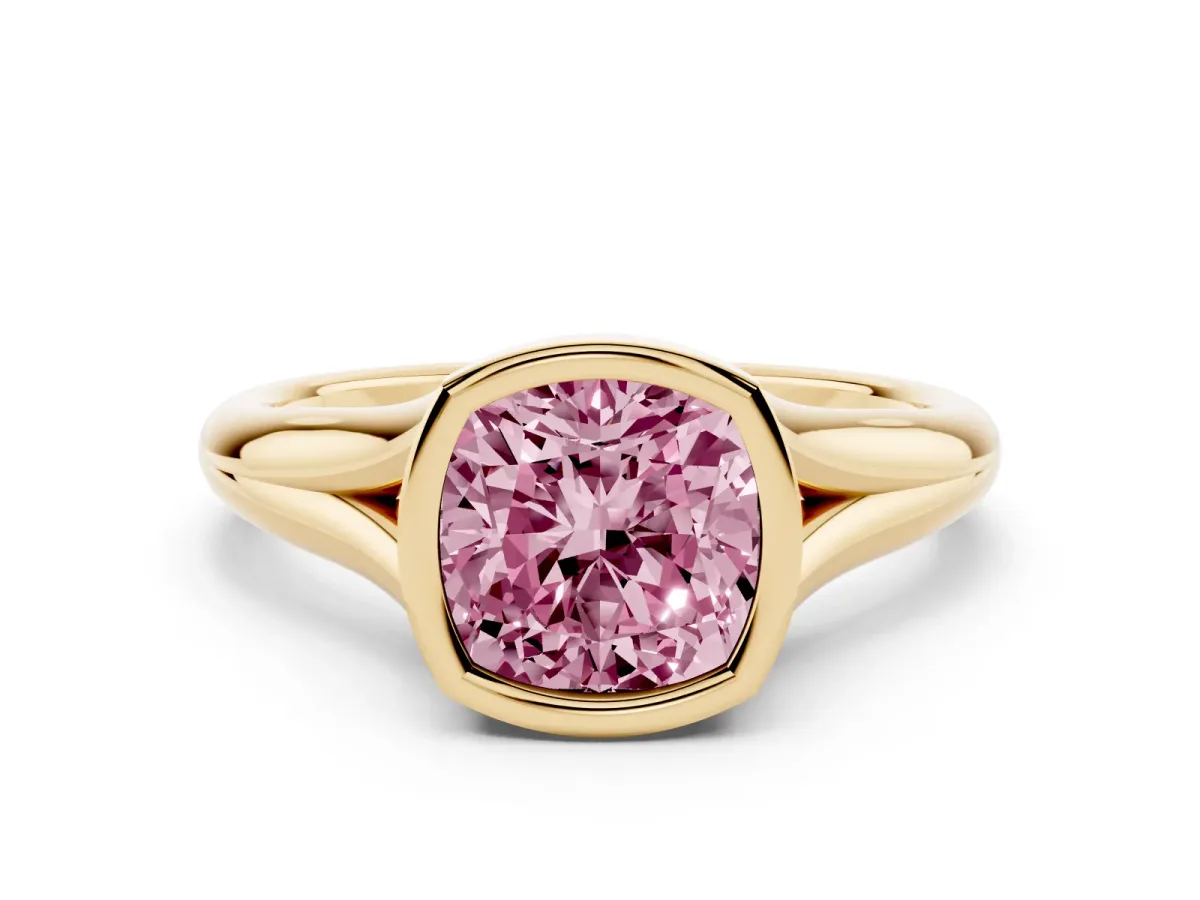 Fancy Pink Bezel Set Cushion Cut Solitaire Diamond Ring with Smooth Band Yellow gold