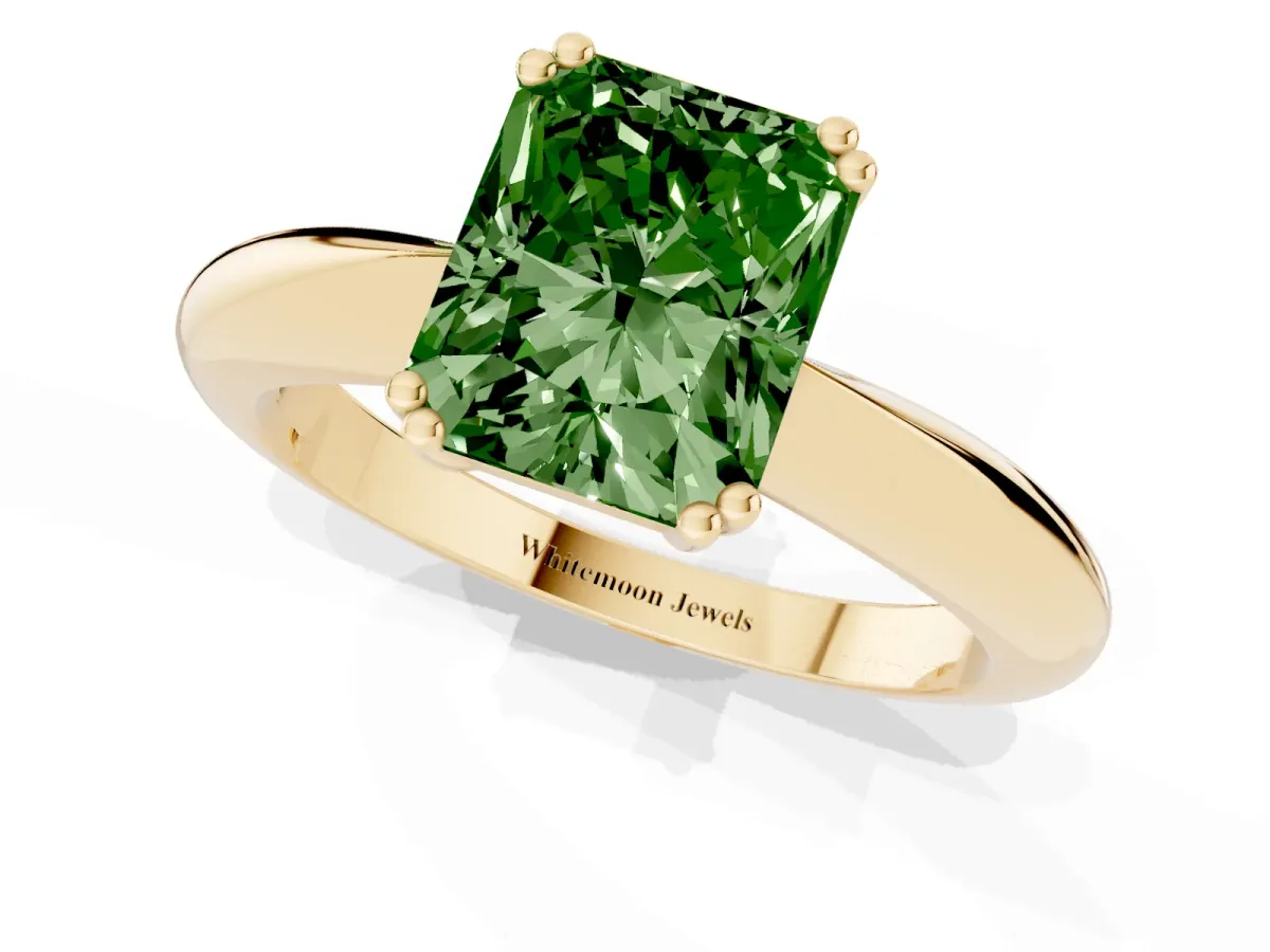 Fancy Green Radiant Cut Cut Solitaire Engagement Ring with Tapered Band and Four-Prong Setting Yellow gold