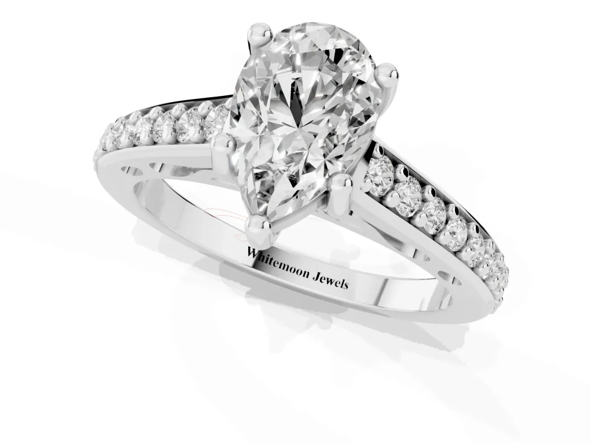 Pear Cut Solitaire Prong Set Diamond Engagement Ring with Pave Band Silver