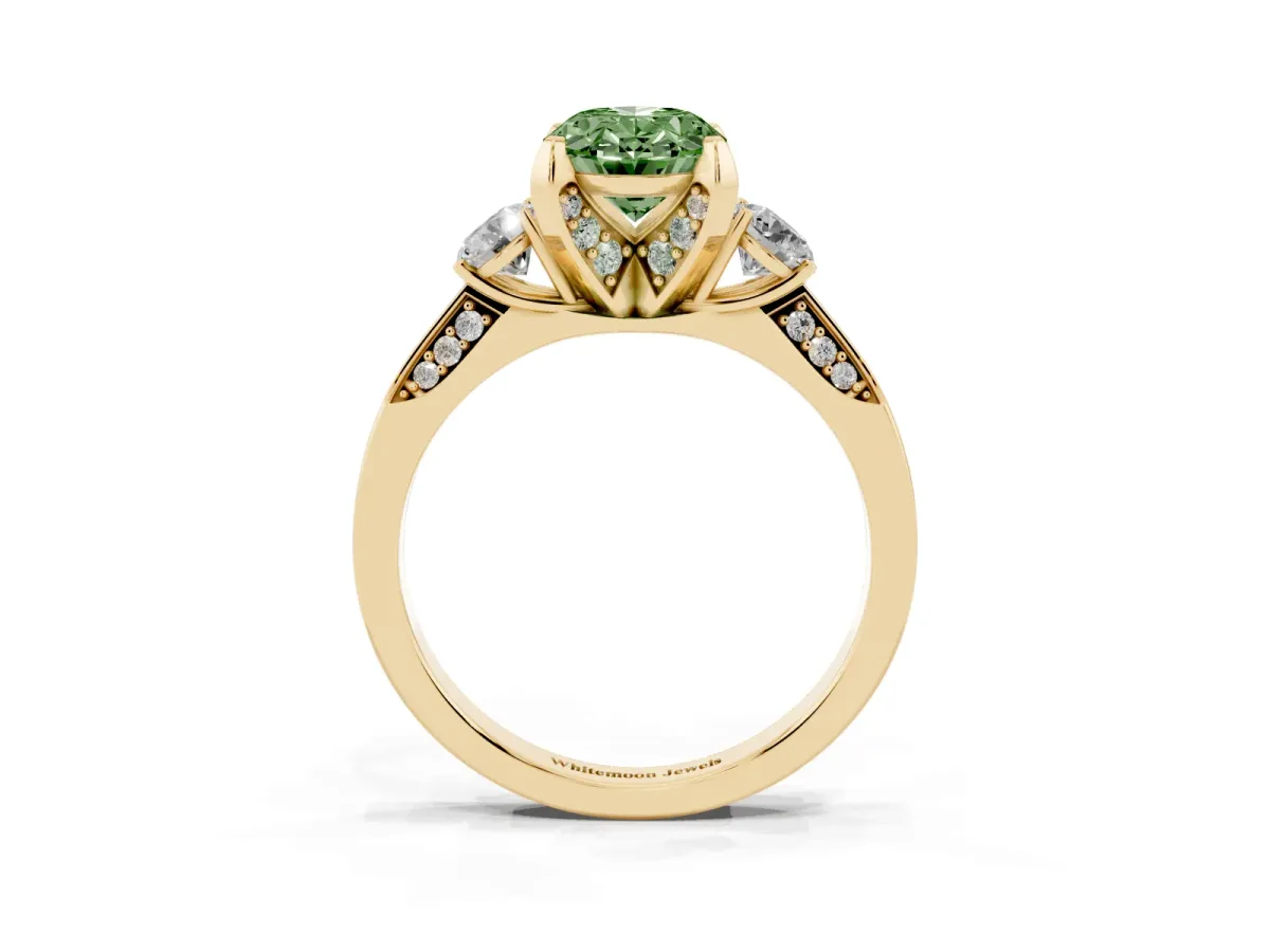 Fancy Green Oval Cut Brilliant Three-Stone Diamond Ring with Pavé Band and Four-Prong Setting Yellow gold