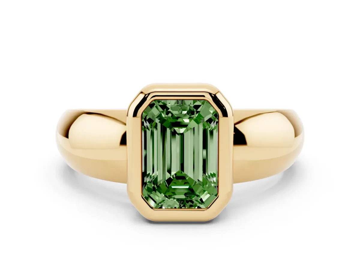 Fancy Green Bezel Set Emerald Cut Solitaire Ring with Wide Band Yellow gold
