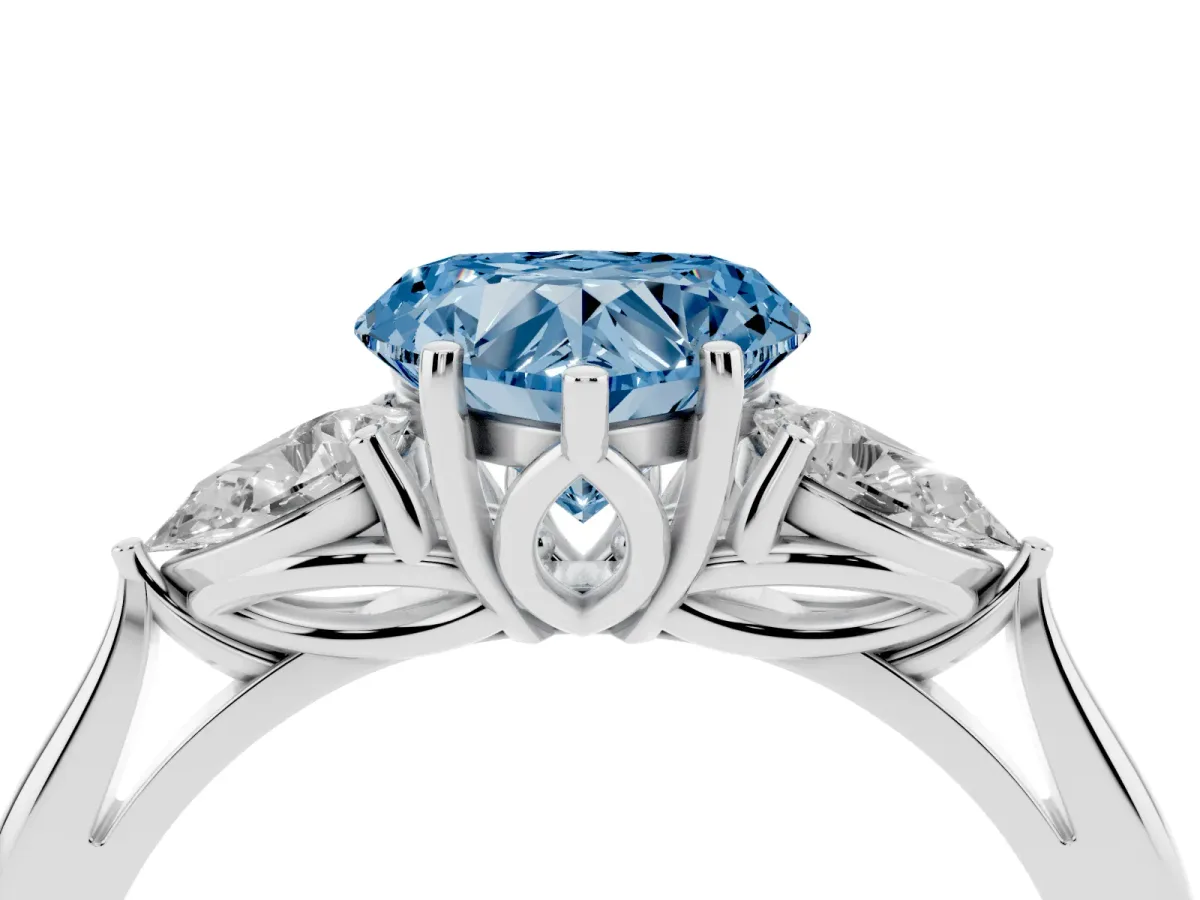 Fancy Blue Heart Cut Diamond Three-Stone Ring with Pear Side Stones and Prong Setting Silver