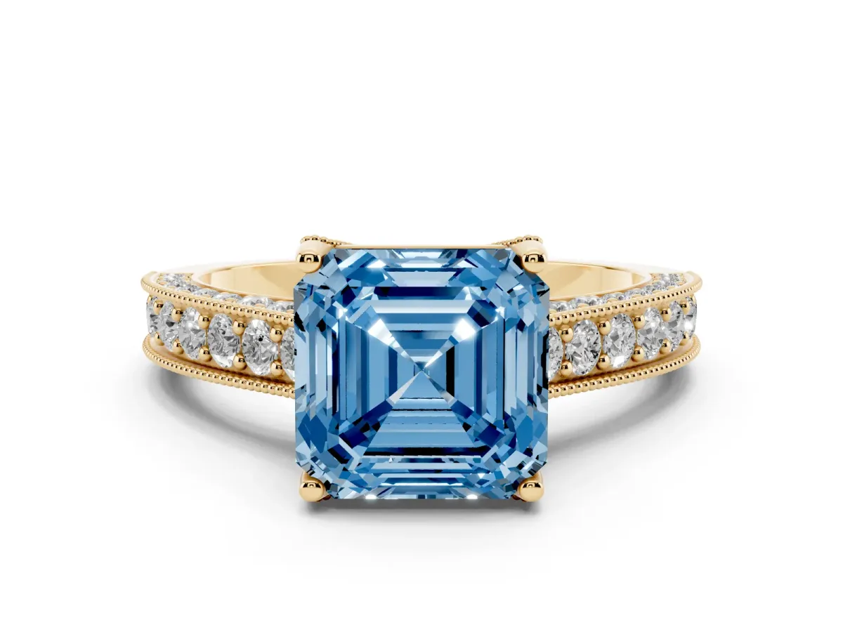 Fancy Blue Asscher Cut Cut Diamond Solitaire Ring with Milgrain Pave Band and Four Prong Setting Yellow gold