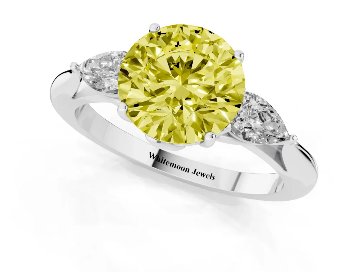 Fancy Yellow Three-Stone Round Cut Brilliant Diamond Solitaire Ring with Tapered Band and Four-Prong Setting Silver