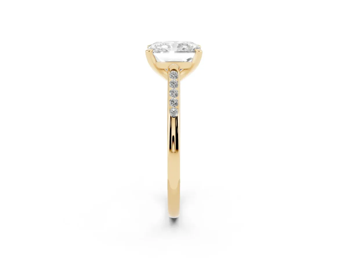 Radiant Cut Diamond Solitaire Ring with Channel Set Round Band and Prong Setting Yellow gold