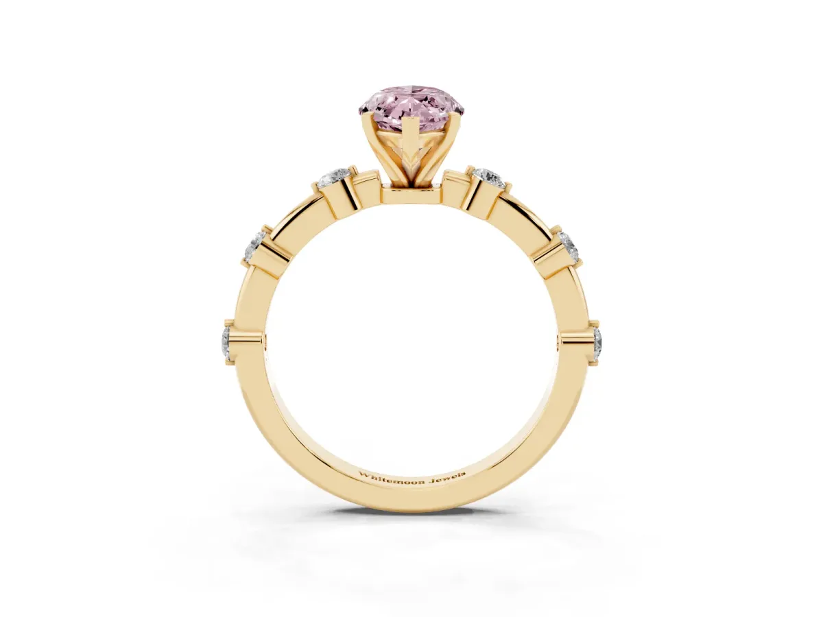 Fancy Pink Marquise Cut Solitaire Diamond Ring with Bezel Set Side Stones and Prong Setting Yellow gold