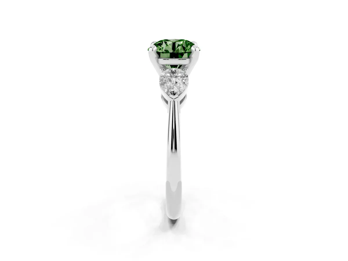 Fancy Green Three-Stone Round Cut Diamond Ring with Pear Side Stones and Four-Prong Setting Platinum
