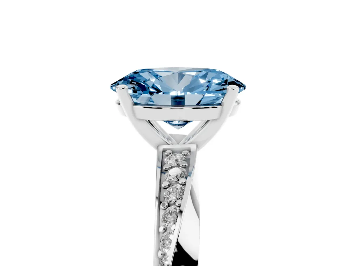 Fancy Blue Oval Cut Diamond Engagement Ring with Side Stone Accents and Four-Prong Setting Silver