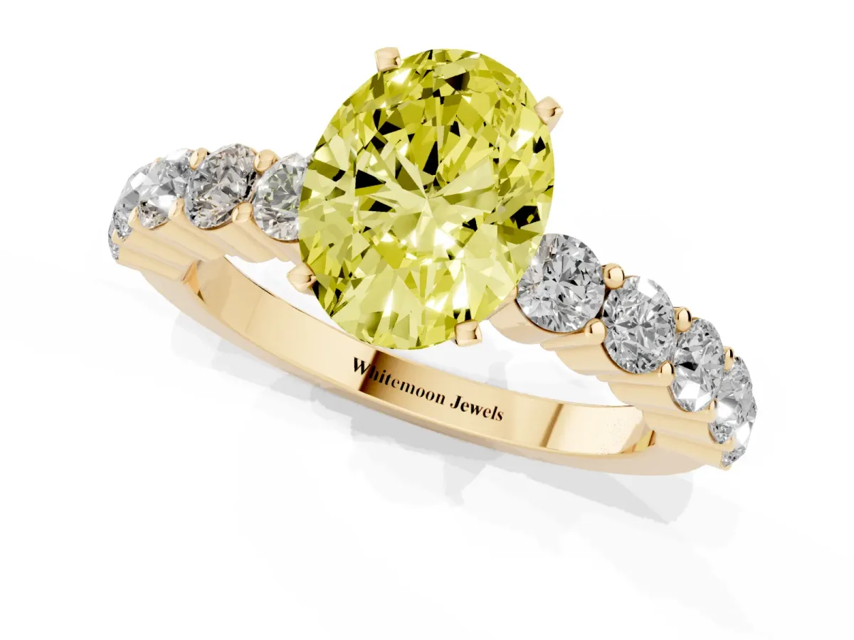 Fancy Yellow Oval Cut Diamond Solitaire Ring with Shared Prong Round Side Stones Yellow gold