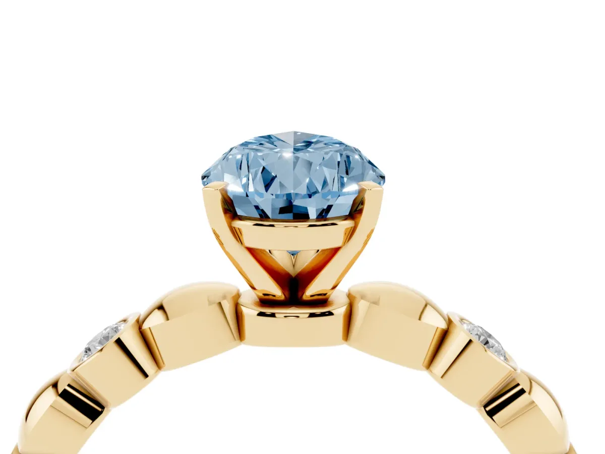 Fancy Blue Pear Cut Solitaire Bezel-Set Diamond Ring with Beaded Band and Four-Prong Setting Yellow gold