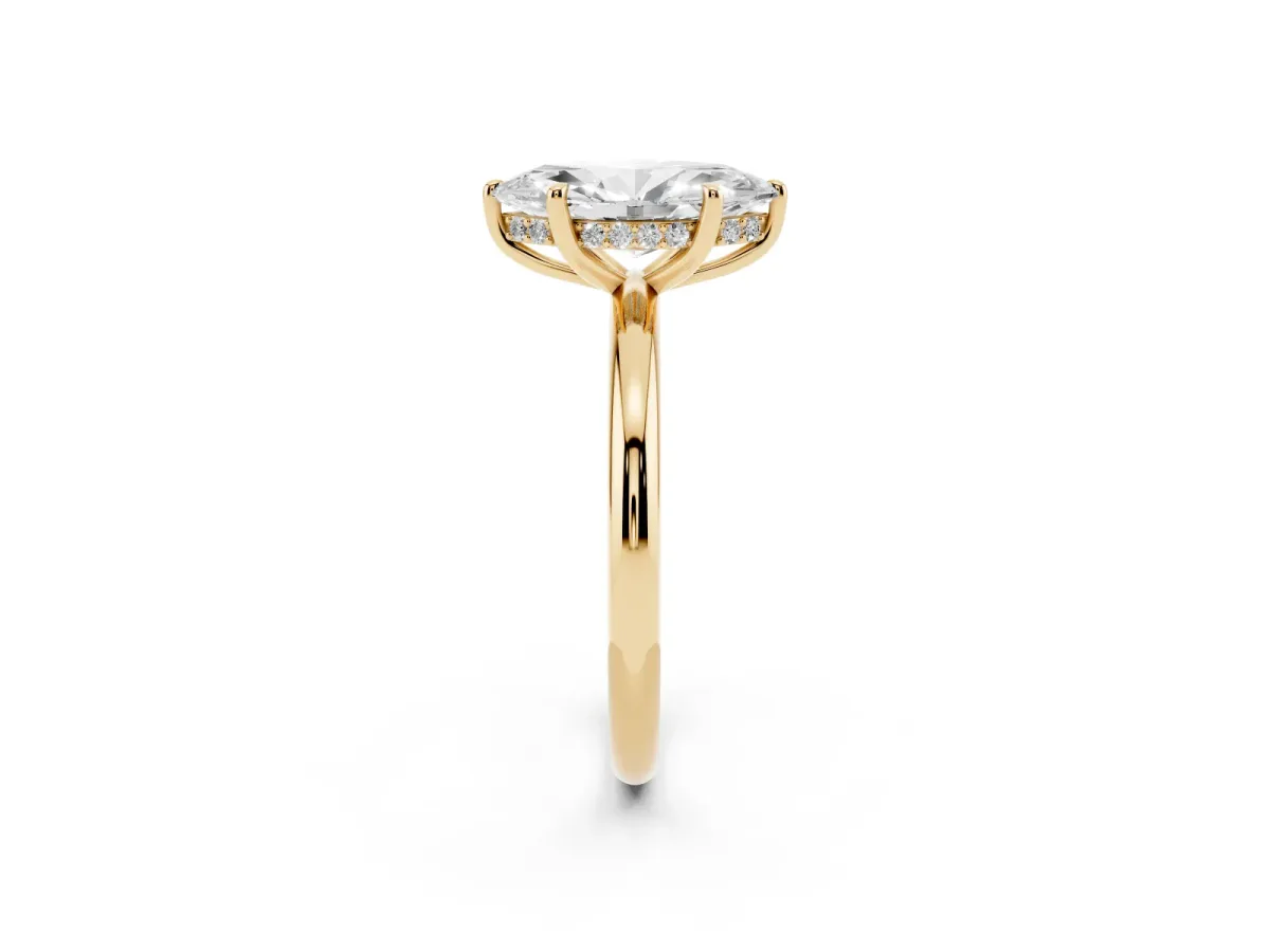Marquise Cut Diamond Solitaire Ring with Thin Band and Four-Prong Setting Yellow gold