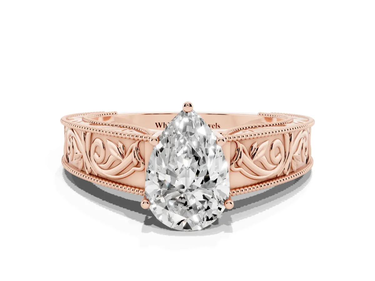 Pear Cut Diamond Solitaire Ring with Engraved Band and Four-Prong Setting Rose gold