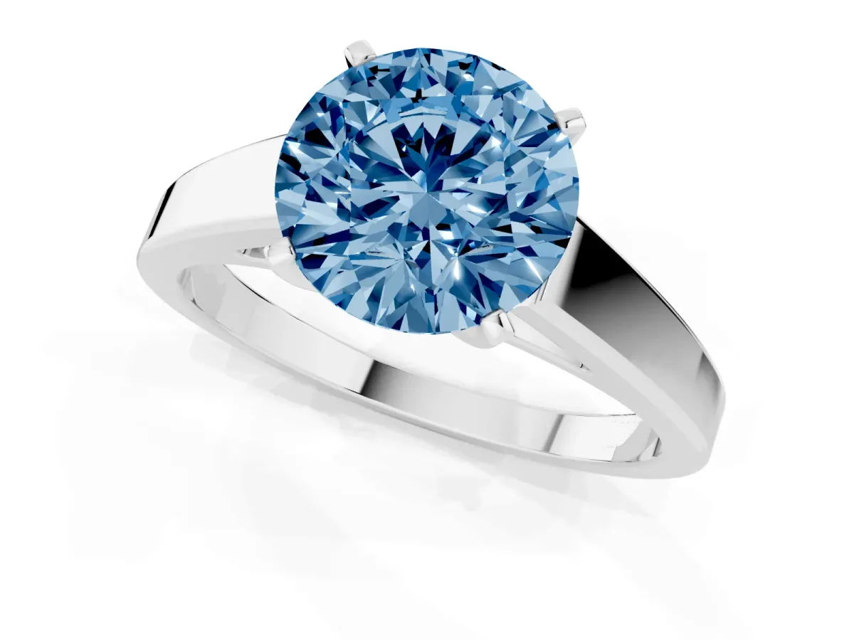 Fancy Blue Round Cut Solitaire Engagement Ring with Four-Prong Setting and Tapered Band Platinum