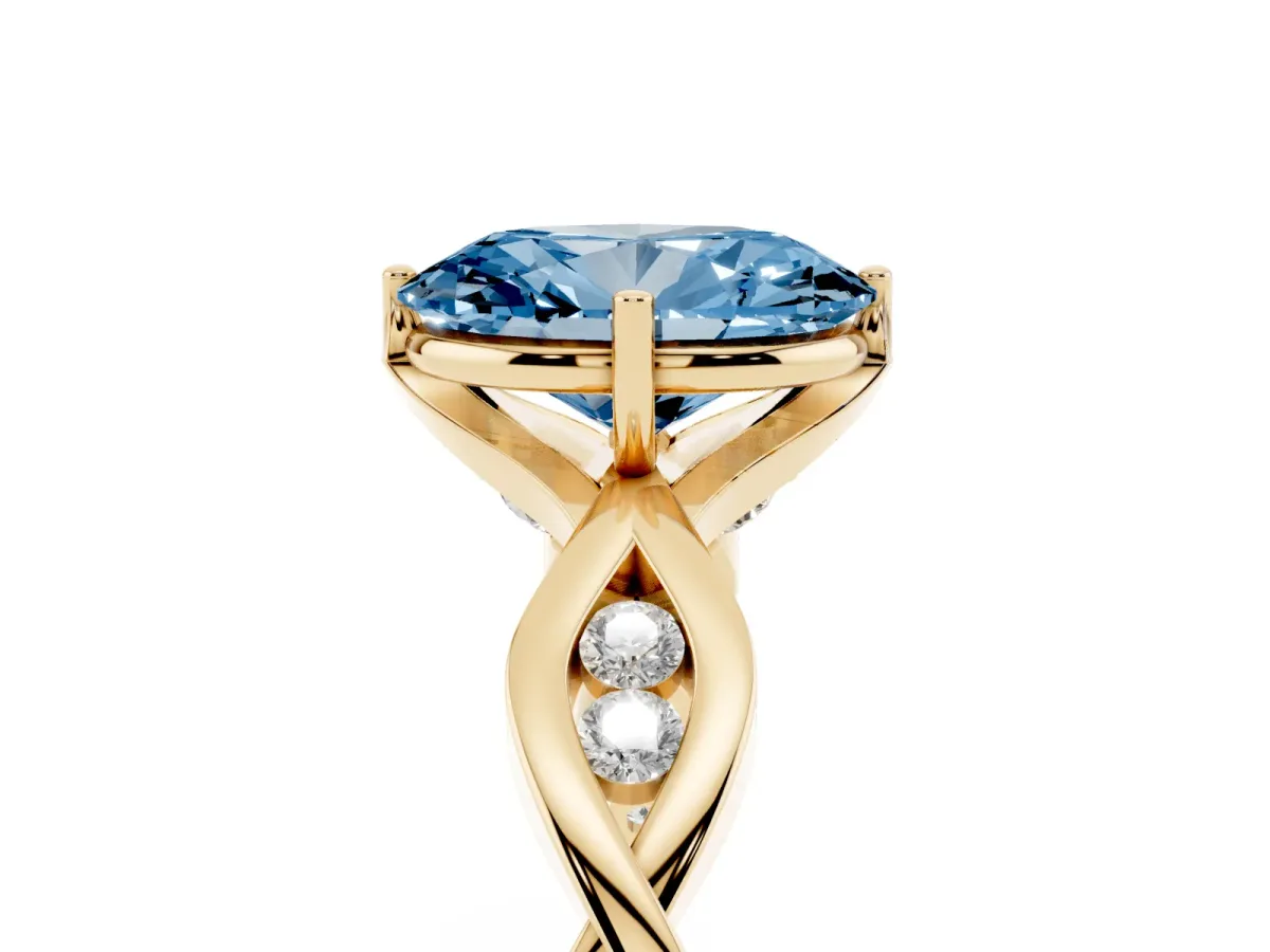 Fancy Blue Oval Cut Solitaire Twist Band with Leaf Prong Setting Yellow gold