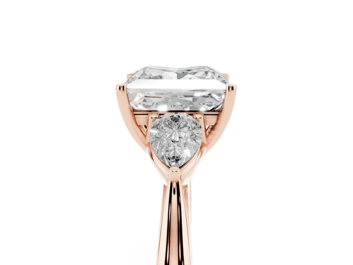 Princess Cut Diamond Three-Stone Ring with Pear Side Stones and Prong Setting Rose gold